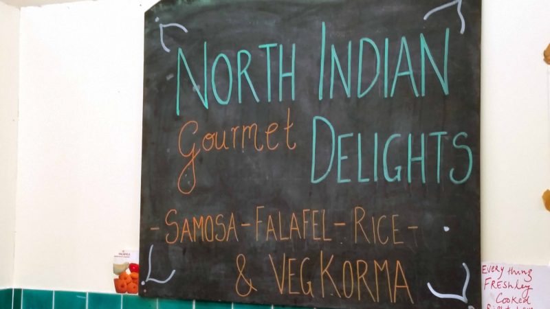 North Indian Gourmet Delights Sign