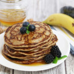 rye sourdough pancakes with maple syrup and blue berries