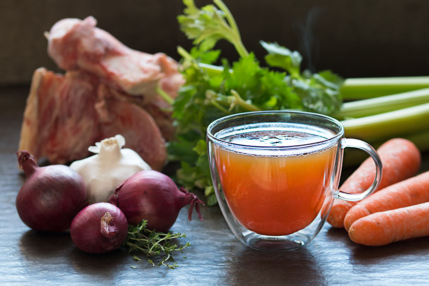 healthy beef bone broth in a cup