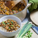 chickpea and potato curry with bowl of rice