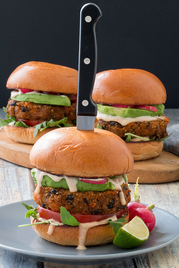 Quinoa black bean burgers with knife