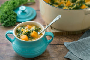 Vegan Kale and Pumpkin soup with Orzo with spoon