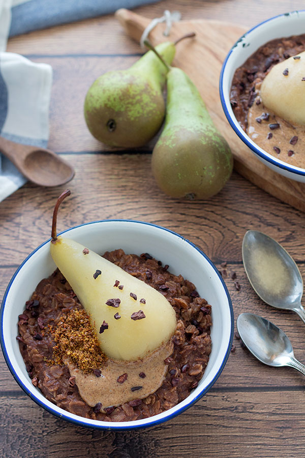 Healthy chocolate porridge with poached pear